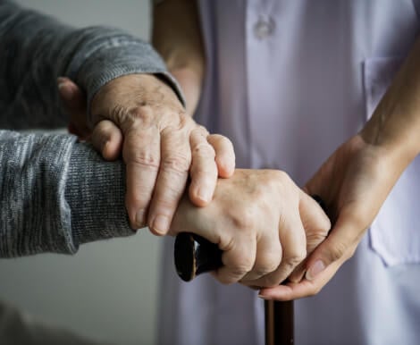 Skilled Nurse Assisting Elderly With Walking Memory Care Facility Conroe TX Skilled Nurse Assisting Elderly With Walking Memory Care Facility Conroe TX