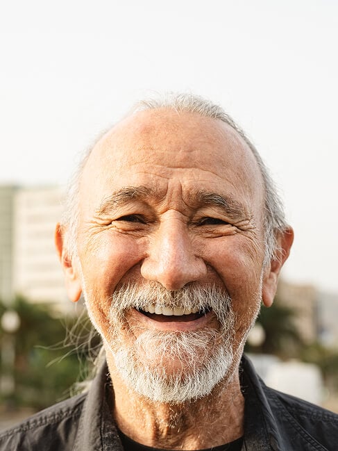 Elderly Man Smiling at Nursing Home in Colleyville